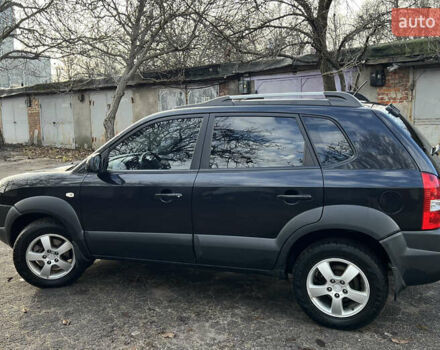 Чорний Хендай Туксон, об'ємом двигуна 2 л та пробігом 240 тис. км за 8500 $, фото 10 на Automoto.ua