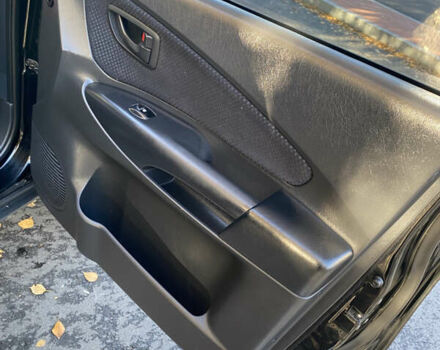 Черный Хендай Туксон, объемом двигателя 1.98 л и пробегом 218 тыс. км за 7200 $, фото 21 на Automoto.ua