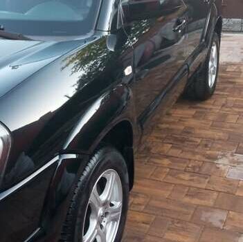 Черный Хендай Туксон, объемом двигателя 2 л и пробегом 187 тыс. км за 8800 $, фото 7 на Automoto.ua