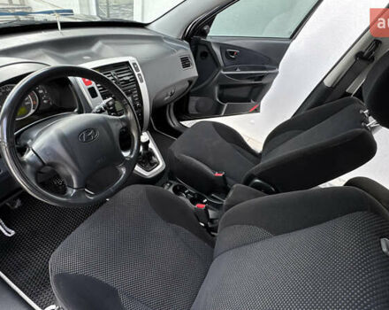 Черный Хендай Туксон, объемом двигателя 2 л и пробегом 67 тыс. км за 9999 $, фото 31 на Automoto.ua