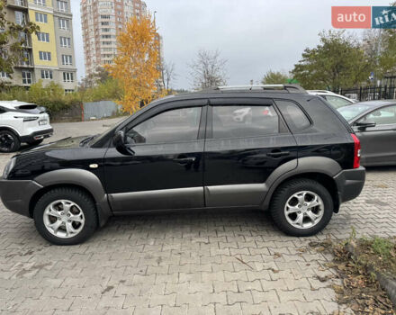 Черный Хендай Туксон, объемом двигателя 2 л и пробегом 157 тыс. км за 8900 $, фото 9 на Automoto.ua