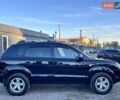 Черный Хендай Туксон, объемом двигателя 2 л и пробегом 230 тыс. км за 7500 $, фото 3 на Automoto.ua