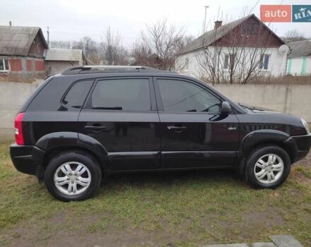 Черный Хендай Туксон, объемом двигателя 2 л и пробегом 237 тыс. км за 7500 $, фото 1 на Automoto.ua