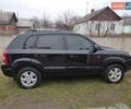 Черный Хендай Туксон, объемом двигателя 2 л и пробегом 237 тыс. км за 7500 $, фото 1 на Automoto.ua