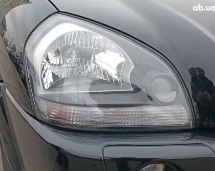 Чорний Хендай Туксон, об'ємом двигуна 2 л та пробігом 192 тис. км за 7990 $, фото 3 на Automoto.ua