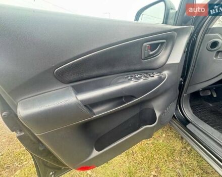 Черный Хендай Туксон, объемом двигателя 2 л и пробегом 148 тыс. км за 9500 $, фото 11 на Automoto.ua