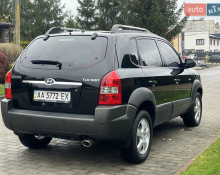 Черный Хендай Туксон, объемом двигателя 2 л и пробегом 107 тыс. км за 8900 $, фото 10 на Automoto.ua