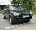 Черный Хендай Туксон, объемом двигателя 2 л и пробегом 233 тыс. км за 7500 $, фото 2 на Automoto.ua