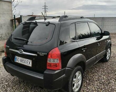 Чорний Хендай Туксон, об'ємом двигуна 2 л та пробігом 185 тис. км за 7499 $, фото 19 на Automoto.ua