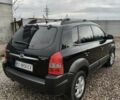 Чорний Хендай Туксон, об'ємом двигуна 2 л та пробігом 185 тис. км за 7499 $, фото 19 на Automoto.ua