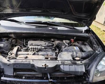 Чорний Хендай Туксон, об'ємом двигуна 1.98 л та пробігом 224 тис. км за 8000 $, фото 1 на Automoto.ua