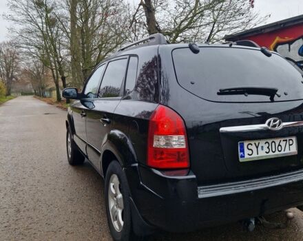 Черный Хендай Туксон, объемом двигателя 2 л и пробегом 190 тыс. км за 1843 $, фото 2 на Automoto.ua