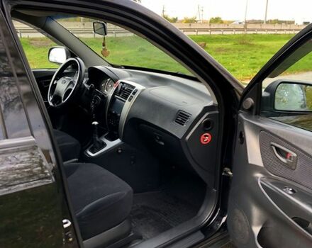 Черный Хендай Туксон, объемом двигателя 2 л и пробегом 220 тыс. км за 8000 $, фото 5 на Automoto.ua