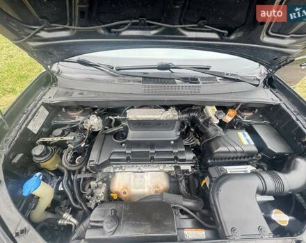 Черный Хендай Туксон, объемом двигателя 2 л и пробегом 148 тыс. км за 9500 $, фото 21 на Automoto.ua