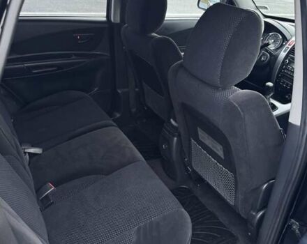 Черный Хендай Туксон, объемом двигателя 2 л и пробегом 253 тыс. км за 8299 $, фото 15 на Automoto.ua