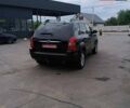 Черный Хендай Туксон, объемом двигателя 2 л и пробегом 255 тыс. км за 8700 $, фото 6 на Automoto.ua
