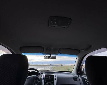 Черный Хендай Туксон, объемом двигателя 2 л и пробегом 253 тыс. км за 8299 $, фото 5 на Automoto.ua