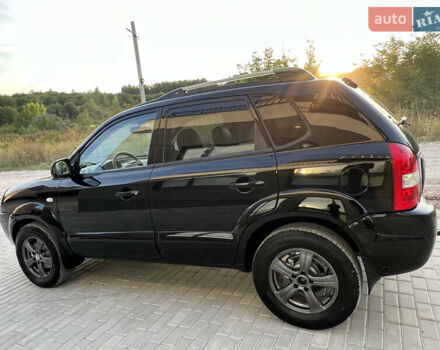 Чорний Хендай Туксон, об'ємом двигуна 1.98 л та пробігом 185 тис. км за 7199 $, фото 6 на Automoto.ua