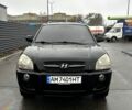 Черный Хендай Туксон, объемом двигателя 2 л и пробегом 193 тыс. км за 7700 $, фото 1 на Automoto.ua