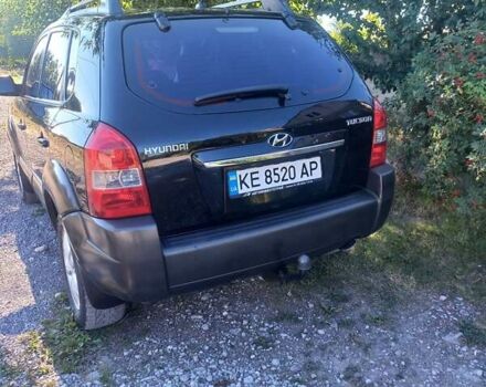 Чорний Хендай Туксон, об'ємом двигуна 2 л та пробігом 162 тис. км за 8800 $, фото 3 на Automoto.ua