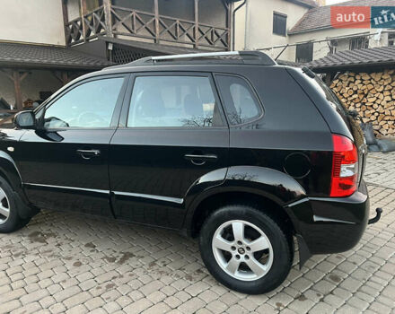 Черный Хендай Туксон, объемом двигателя 2 л и пробегом 276 тыс. км за 7450 $, фото 1 на Automoto.ua