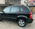 Черный Хендай Туксон, объемом двигателя 2 л и пробегом 276 тыс. км за 7450 $, фото 1 на Automoto.ua