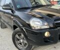 Черный Хендай Туксон, объемом двигателя 1.98 л и пробегом 185 тыс. км за 8500 $, фото 12 на Automoto.ua