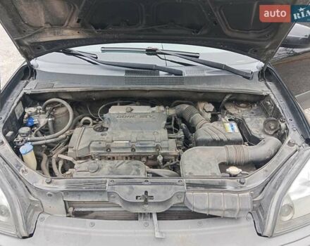 Черный Хендай Туксон, объемом двигателя 1.98 л и пробегом 157 тыс. км за 7500 $, фото 17 на Automoto.ua