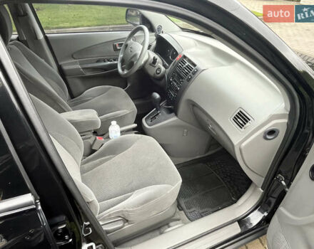 Черный Хендай Туксон, объемом двигателя 2 л и пробегом 107 тыс. км за 8900 $, фото 31 на Automoto.ua