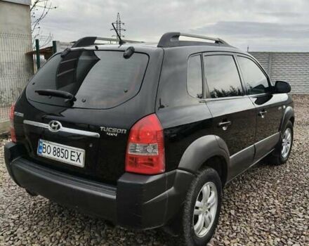 Чорний Хендай Туксон, об'ємом двигуна 2 л та пробігом 185 тис. км за 7499 $, фото 17 на Automoto.ua