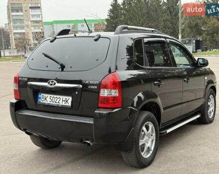 Черный Хендай Туксон, объемом двигателя 1.99 л и пробегом 240 тыс. км за 7200 $, фото 19 на Automoto.ua