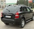 Черный Хендай Туксон, объемом двигателя 1.99 л и пробегом 240 тыс. км за 7200 $, фото 19 на Automoto.ua