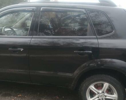 Черный Хендай Туксон, объемом двигателя 1.98 л и пробегом 283 тыс. км за 8800 $, фото 21 на Automoto.ua