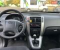 Черный Хендай Туксон, объемом двигателя 1.98 л и пробегом 235 тыс. км за 7500 $, фото 21 на Automoto.ua