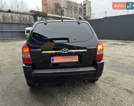Чорний Хендай Туксон, об'ємом двигуна 2 л та пробігом 243 тис. км за 7999 $, фото 15 на Automoto.ua