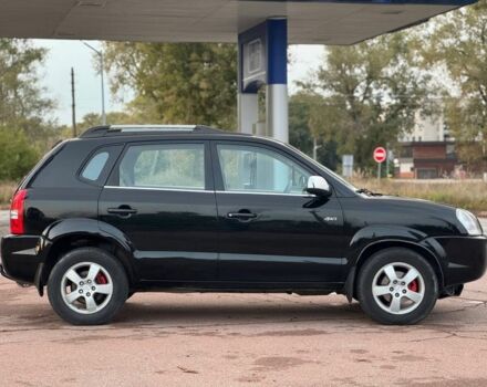 Черный Хендай Туксон, объемом двигателя 2 л и пробегом 353 тыс. км за 6800 $, фото 6 на Automoto.ua