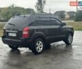 Черный Хендай Туксон, объемом двигателя 1.98 л и пробегом 173 тыс. км за 8800 $, фото 8 на Automoto.ua