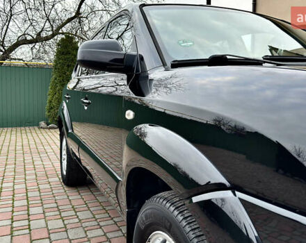 Чорний Хендай Туксон, об'ємом двигуна 2 л та пробігом 182 тис. км за 8299 $, фото 11 на Automoto.ua