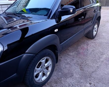 Черный Хендай Туксон, объемом двигателя 2 л и пробегом 261 тыс. км за 8900 $, фото 8 на Automoto.ua