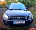 Черный Хендай Туксон, объемом двигателя 2 л и пробегом 187 тыс. км за 7900 $, фото 1 на Automoto.ua