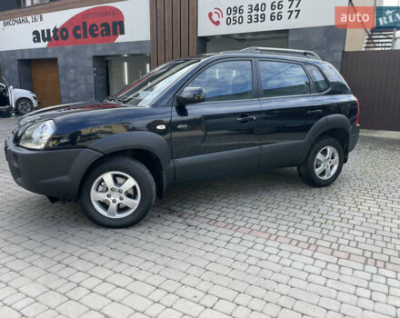 Черный Хендай Туксон, объемом двигателя 1.98 л и пробегом 177 тыс. км за 7600 $, фото 14 на Automoto.ua