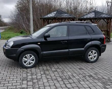 Черный Хендай Туксон, объемом двигателя 2 л и пробегом 230 тыс. км за 8000 $, фото 11 на Automoto.ua