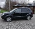 Черный Хендай Туксон, объемом двигателя 2 л и пробегом 230 тыс. км за 8000 $, фото 11 на Automoto.ua