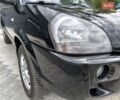 Черный Хендай Туксон, объемом двигателя 2 л и пробегом 137 тыс. км за 8400 $, фото 16 на Automoto.ua