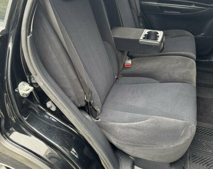 Черный Хендай Туксон, объемом двигателя 2 л и пробегом 157 тыс. км за 8900 $, фото 34 на Automoto.ua