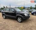 Черный Хендай Туксон, объемом двигателя 1.98 л и пробегом 200 тыс. км за 8000 $, фото 1 на Automoto.ua