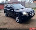 Чорний Хендай Туксон, об'ємом двигуна 2 л та пробігом 208 тис. км за 7500 $, фото 9 на Automoto.ua
