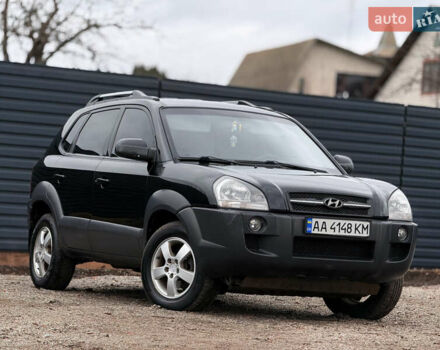 Черный Хендай Туксон, объемом двигателя 2 л и пробегом 252 тыс. км за 7200 $, фото 9 на Automoto.ua