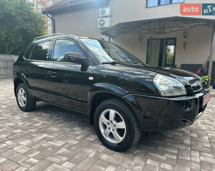 Черный Хендай Туксон, объемом двигателя 2 л и пробегом 218 тыс. км за 8700 $, фото 11 на Automoto.ua