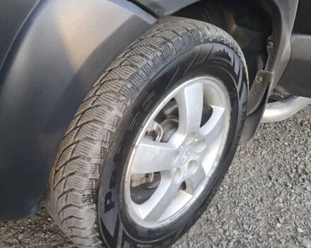 Черный Хендай Туксон, объемом двигателя 2 л и пробегом 197 тыс. км за 8000 $, фото 9 на Automoto.ua